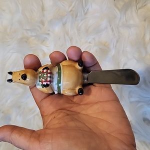 Harry and David Christmas Reindeer Spreader holding present